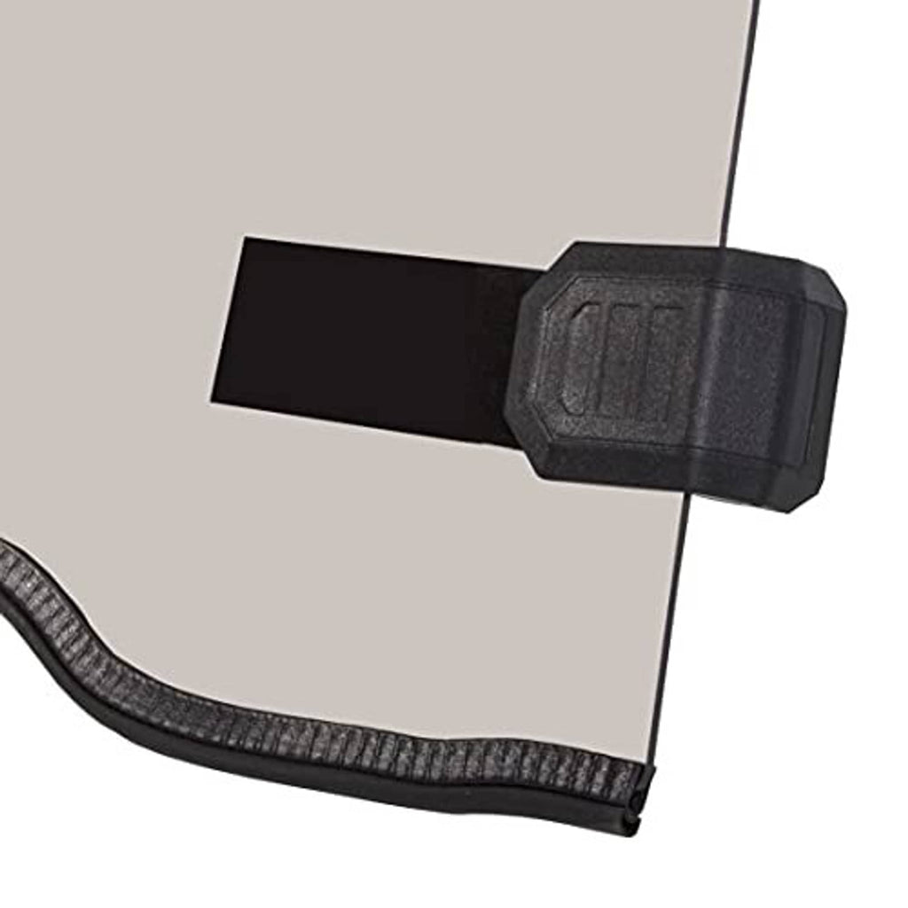 Closeup of windshield corner: light tint panel with black mounting clip and rubber seal