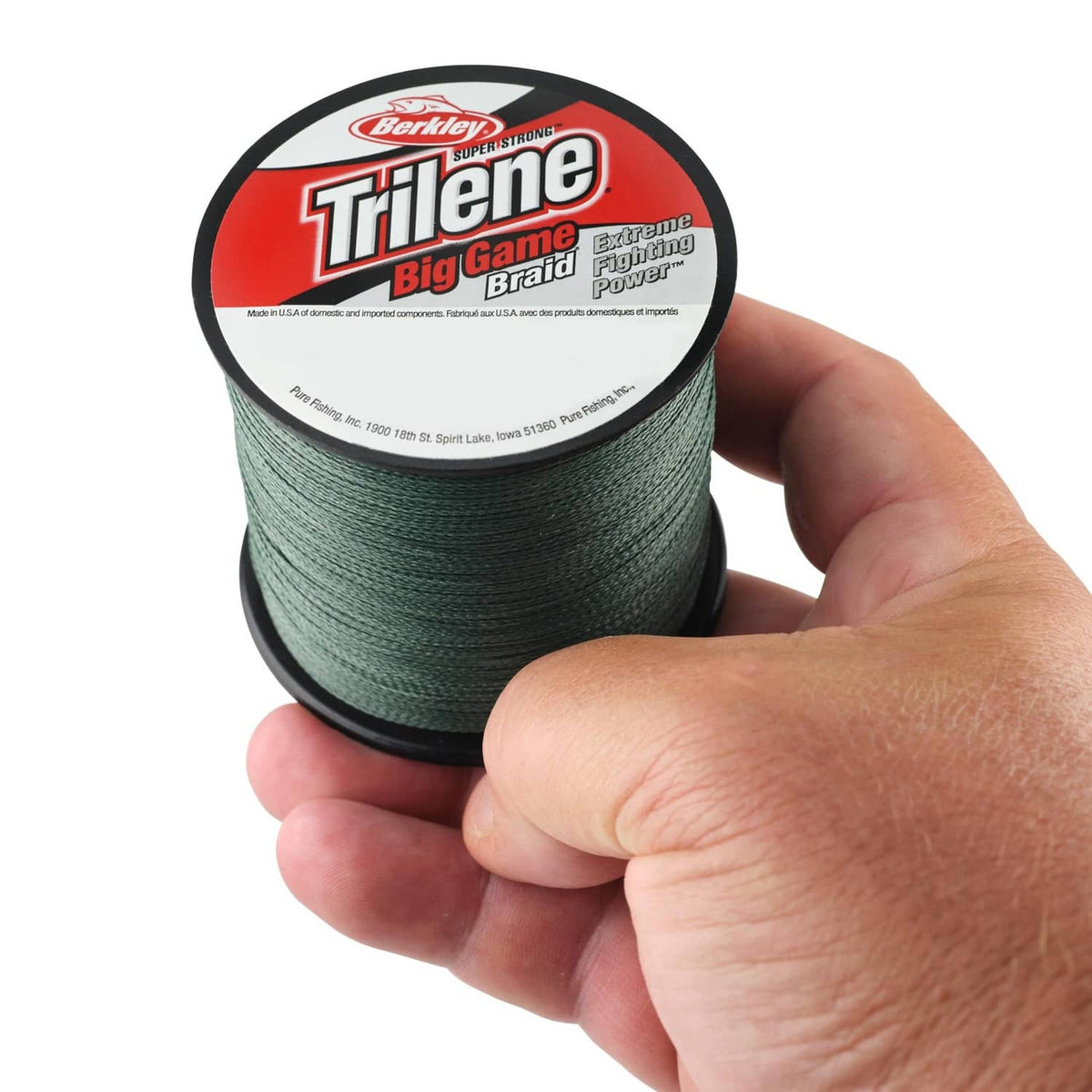 Green fishing line spool held in hand, Berkley Trilene label visible