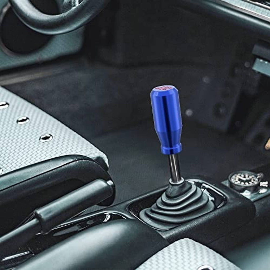 Blue shift knob installed on a manual gear shifter in car interior