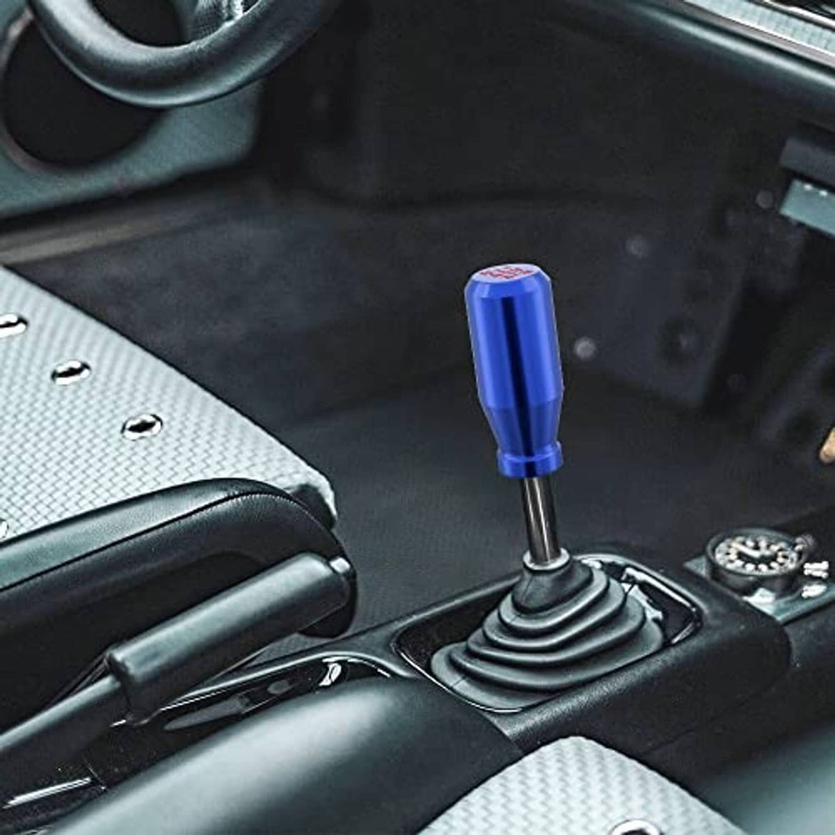 Blue shift knob installed on a manual gear shifter in car interior