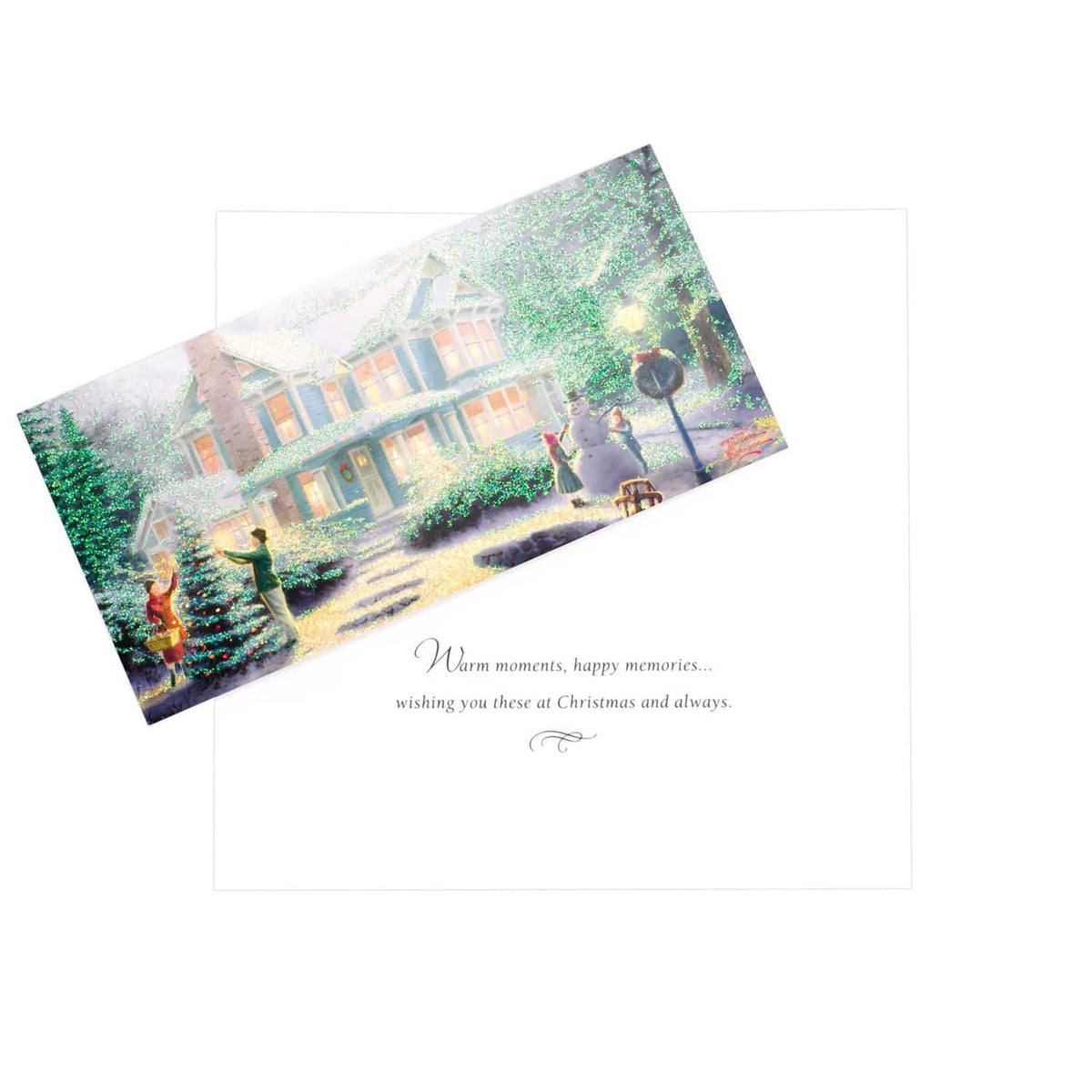 Christmas greeting card with snowy house illustration and printed warm holiday message