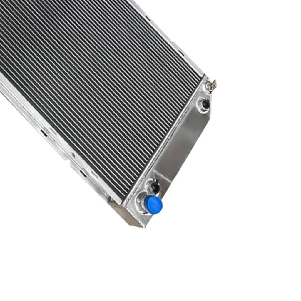 Aluminum 4-row radiator corner view with blue bushing and welded end tank