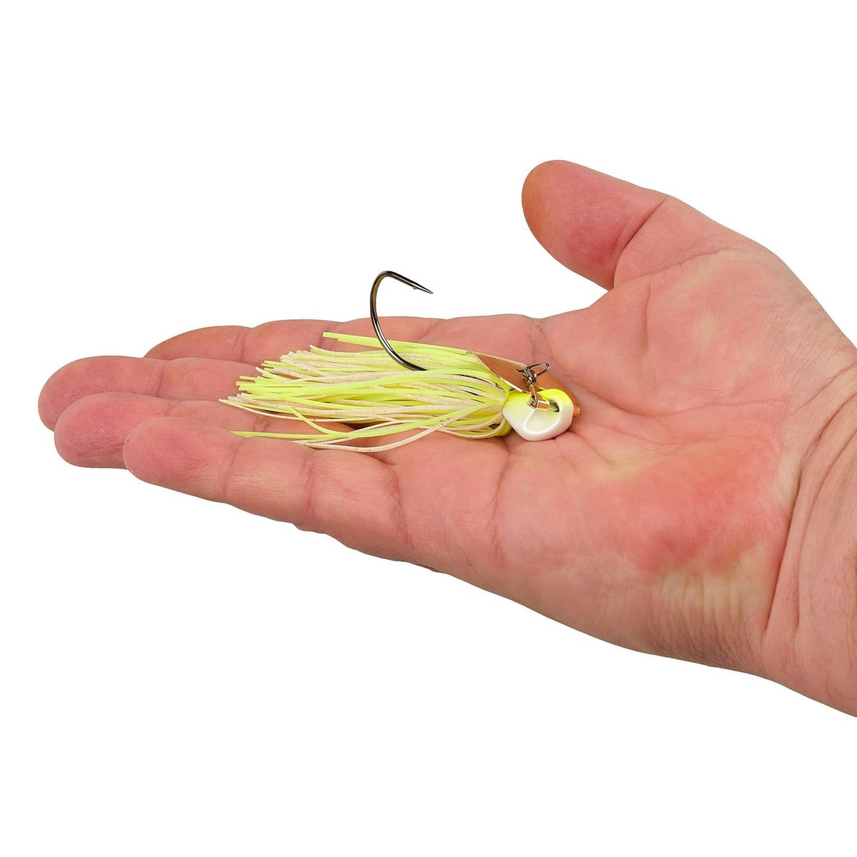 Chartreuse and white bladed jig shown in palm with hook and silicone skirt