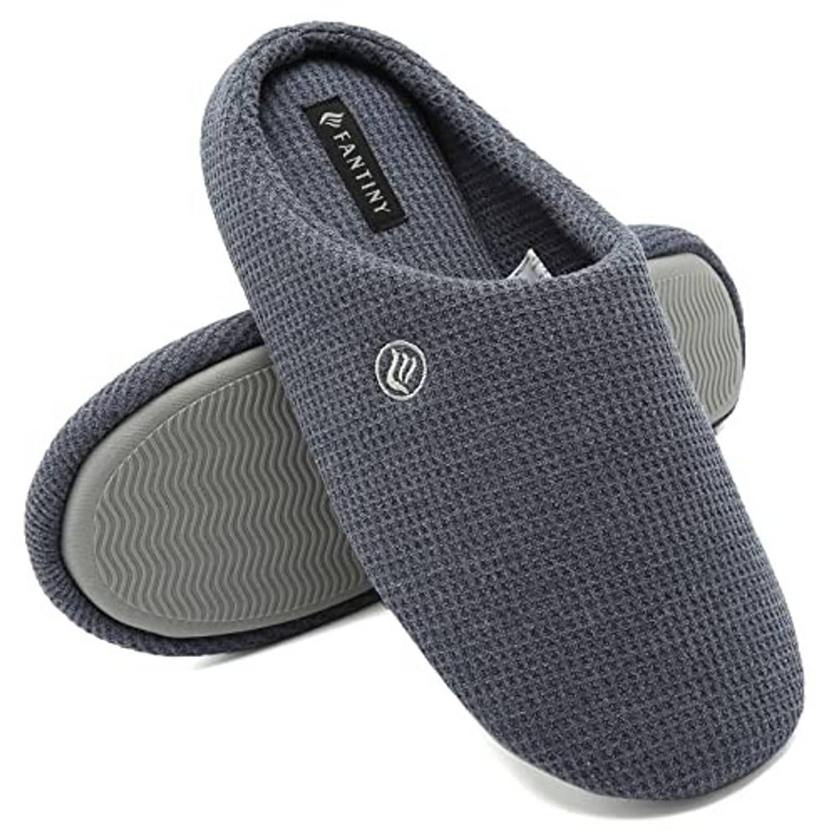 Dark blue textured slip-on slippers with open heel and contoured gray sole