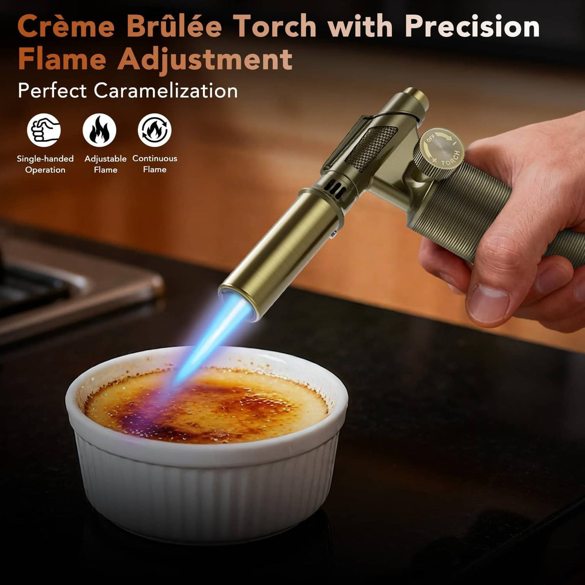 Gold butane torch in hand with blue flame for precise caramelizing