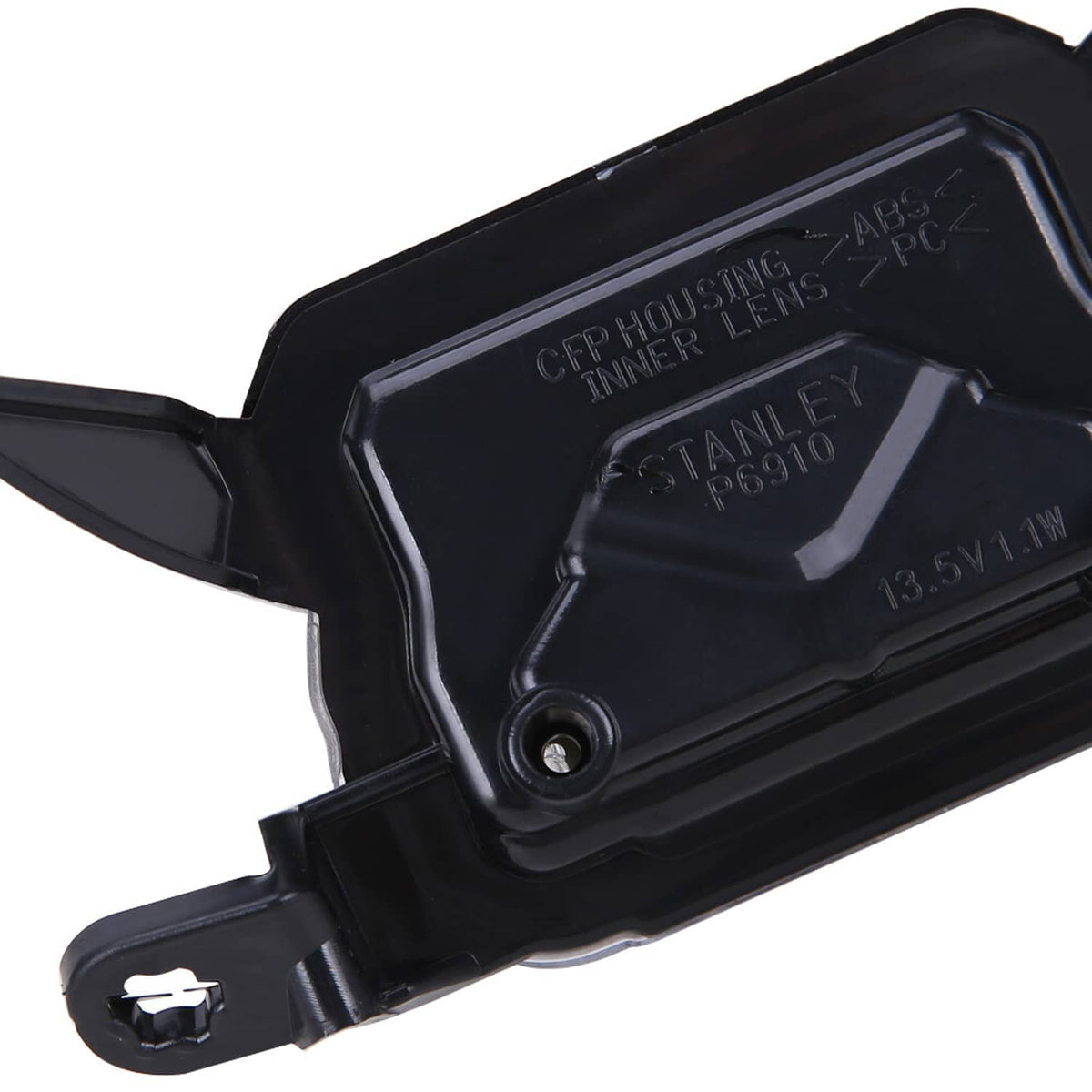Front upper headlight lamp rear housing close-up with model markings and mounting tab