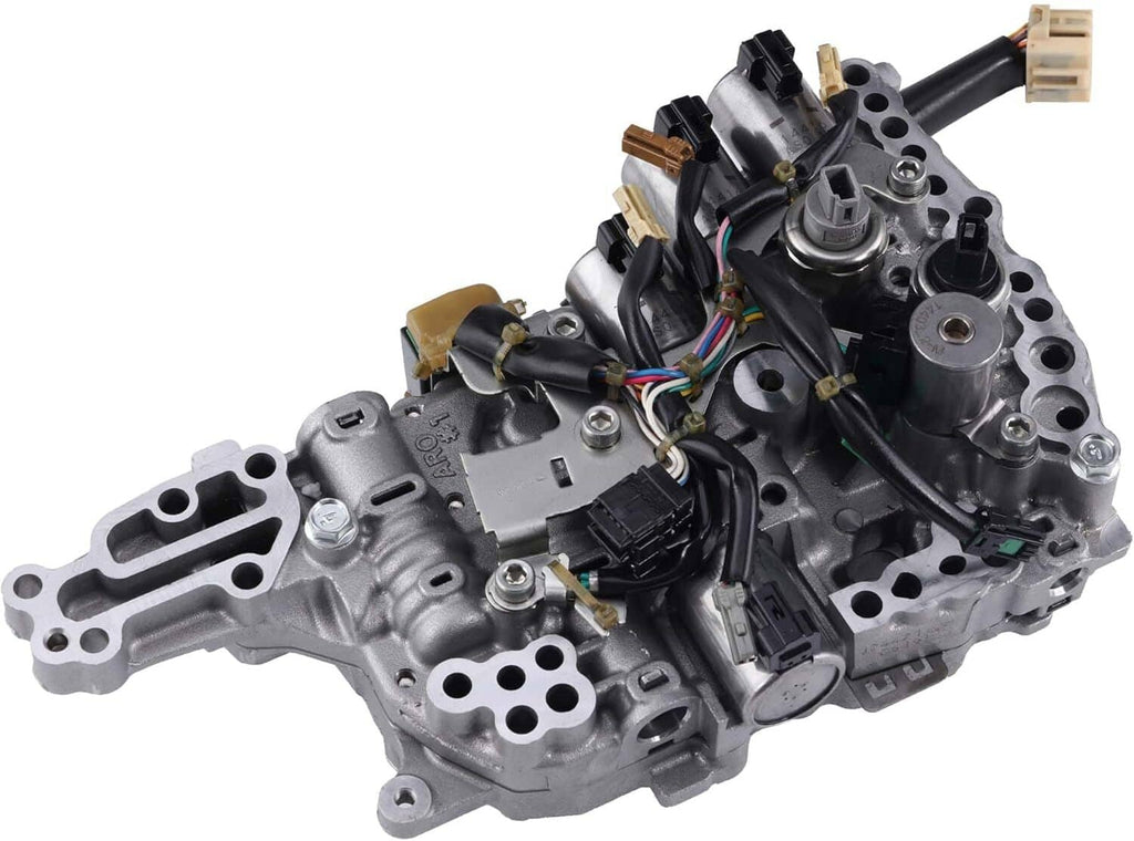 Transmission control valve body with solenoids, bundled wires, and electrical connector plugs