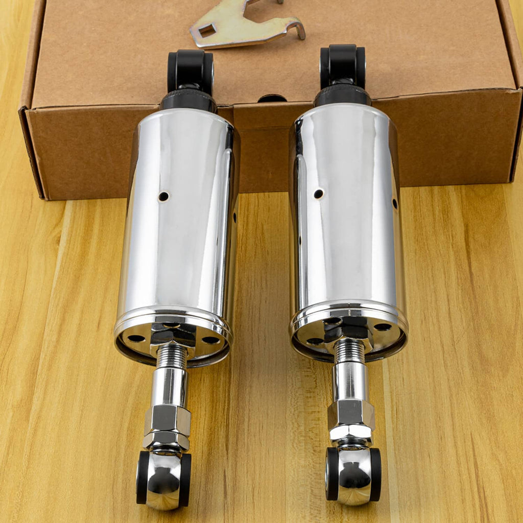 Chrome adjustable shock absorbers pair with black top caps and threaded lower mounting rods