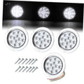 White 4-inch LED strobe trailer tail lights set with mounting screws and wire leads.