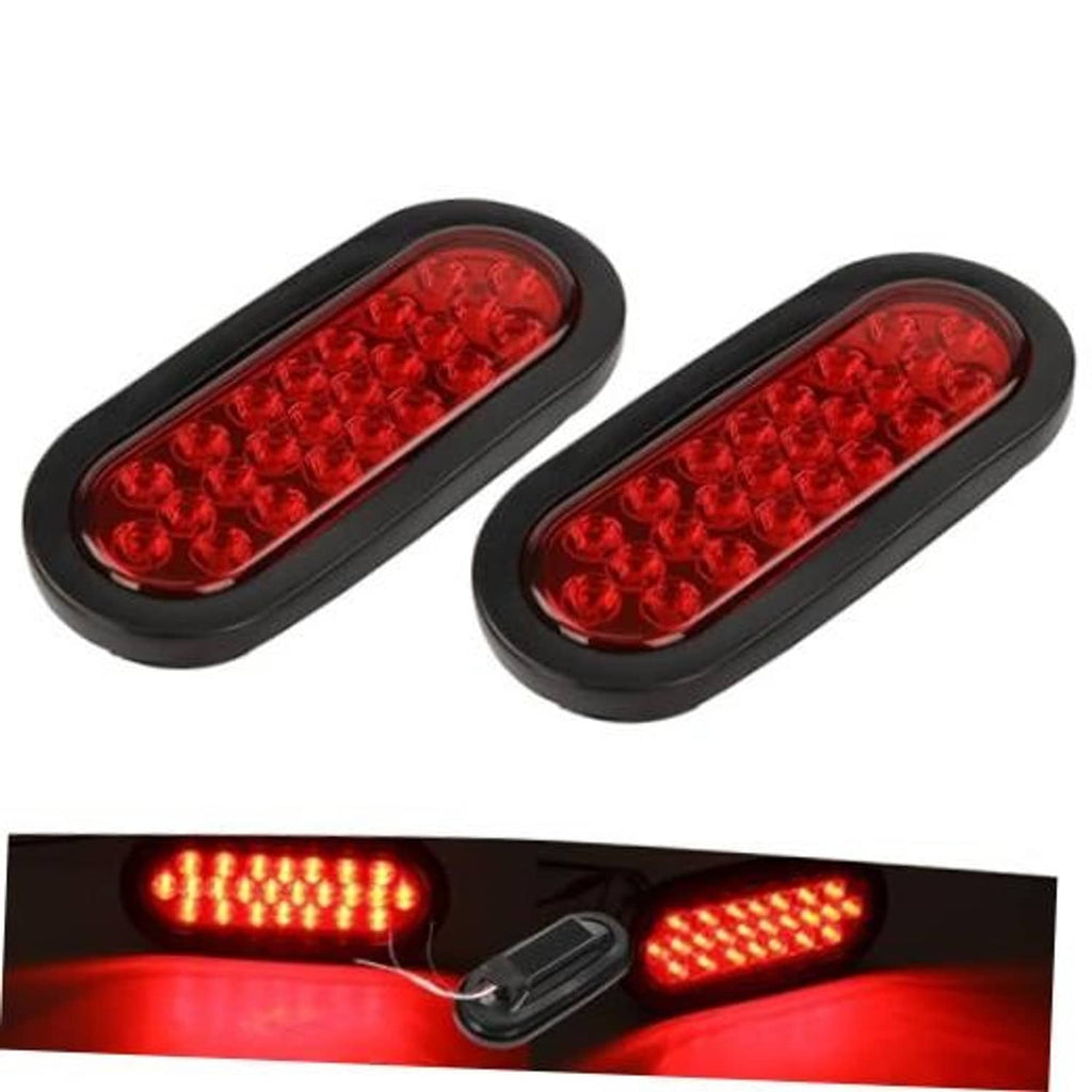 Pair of oval red LED trailer tail lights with black rubber housing