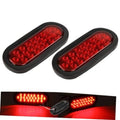 Pair of oval red LED trailer tail lights with black rubber housing