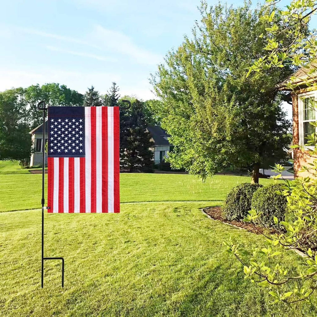 Garden flag on yard stakes with anti-wind clips and rubber stoppers installed