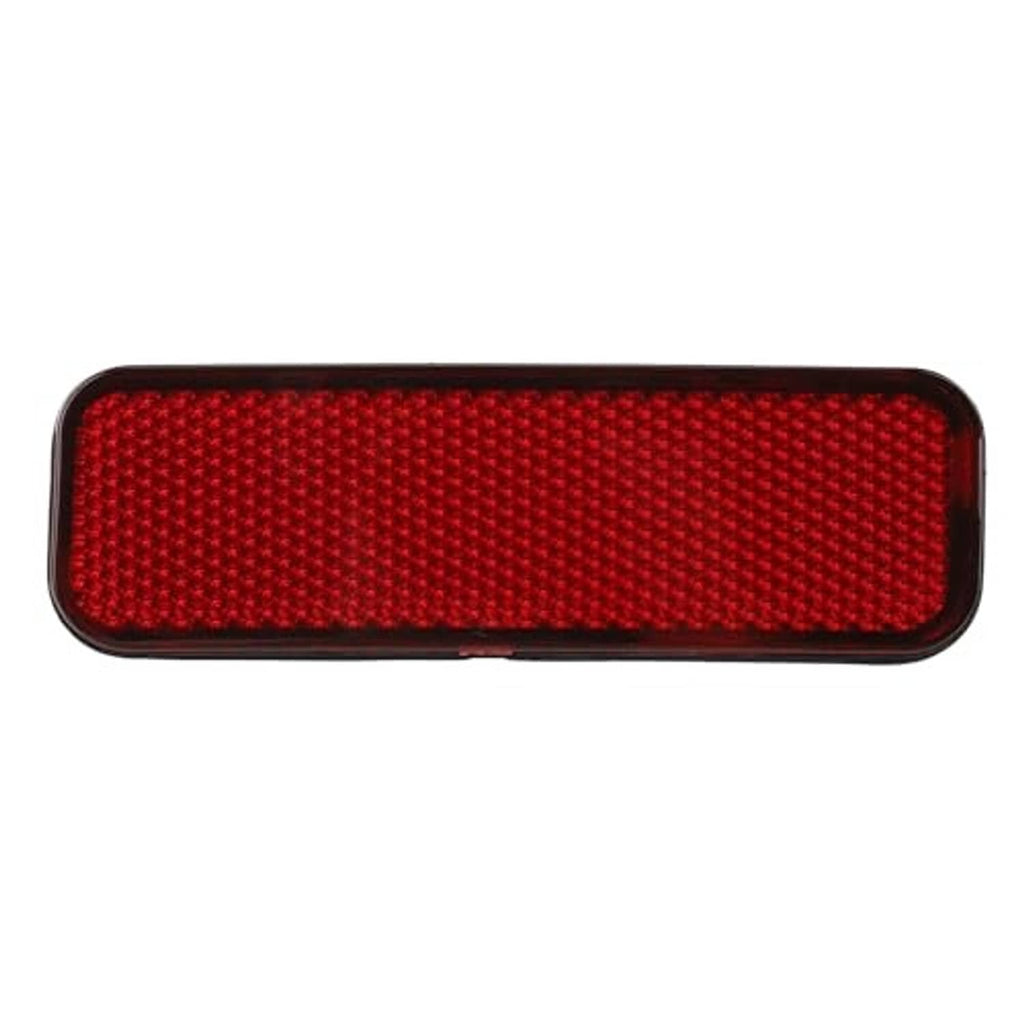 Red rectangular rear bumper reflector with honeycomb-texture lens and black trim