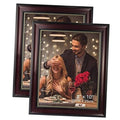 Brown wooden picture frame with glowing LED-style border, tabletop stand visible