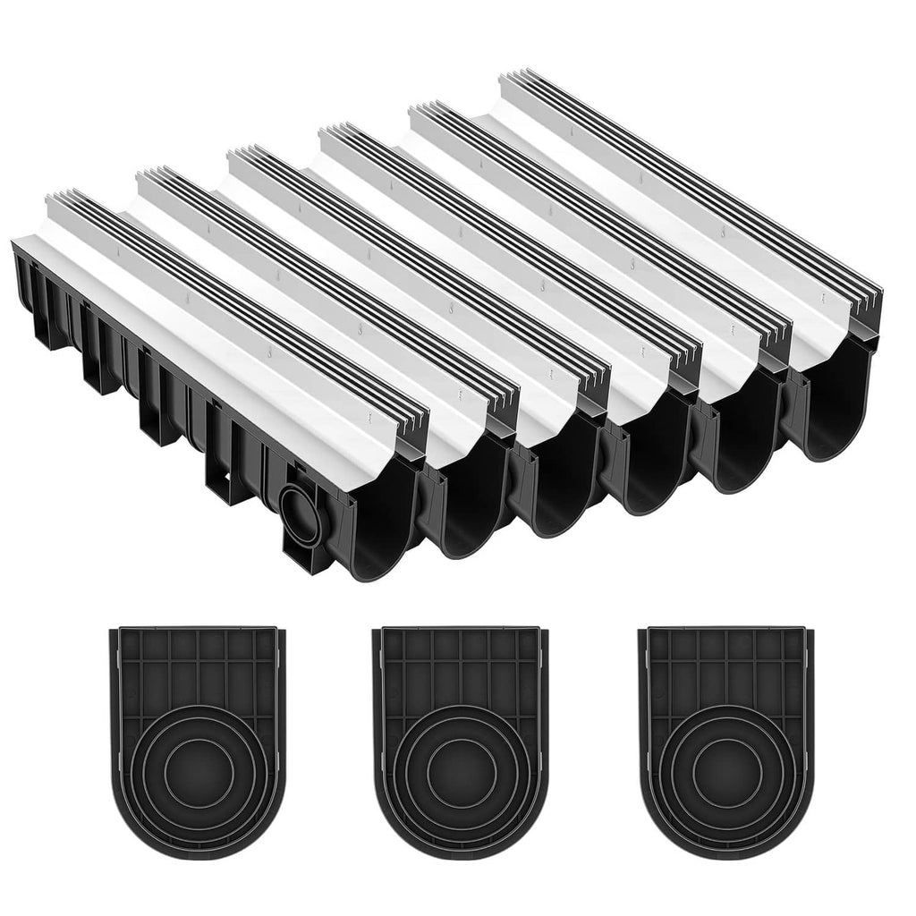 Set of linear trench drain channels with slotted steel grates and round outlet ends