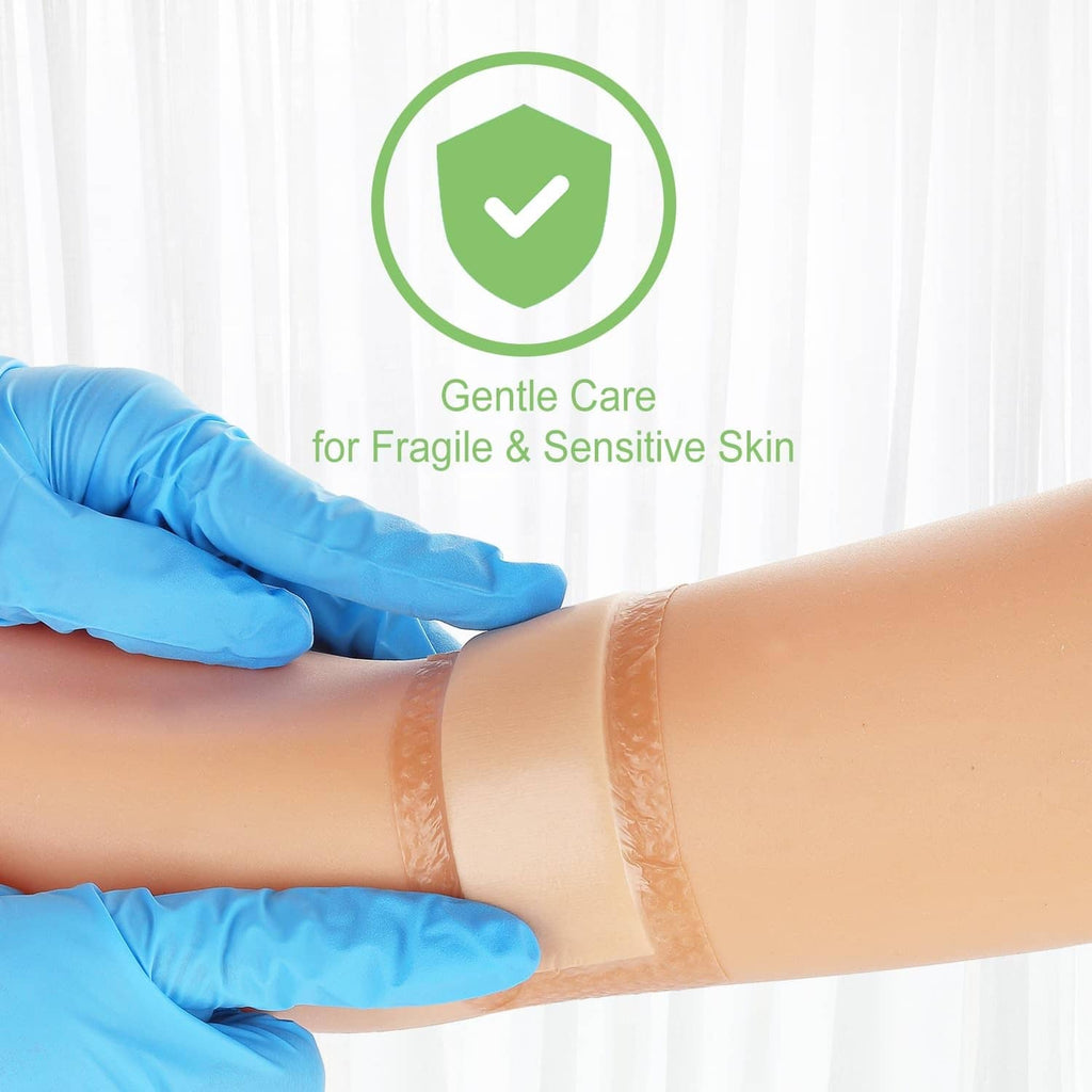 Tan silicone foam border dressing on leg with blue-gloved hands
