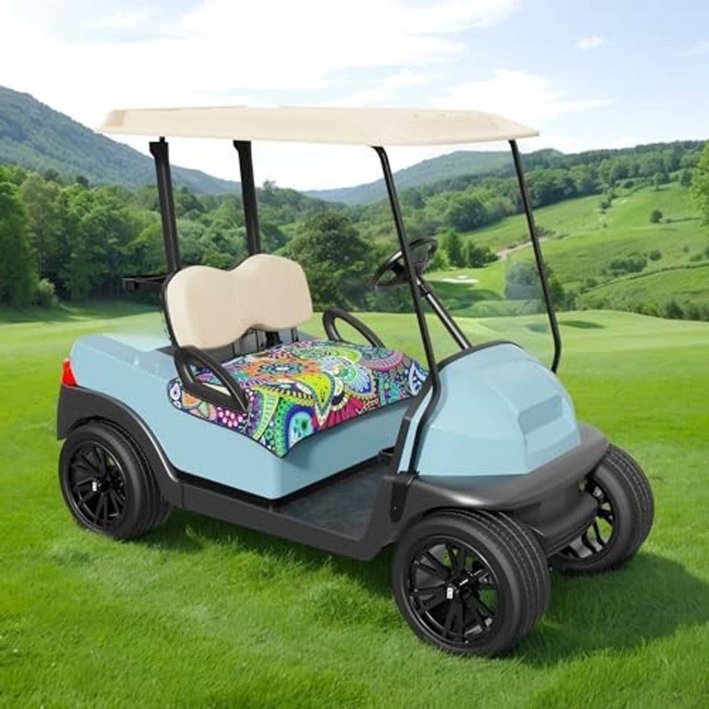 Mandala patterned golf cart seat blanket on front seat of a blue-green cart