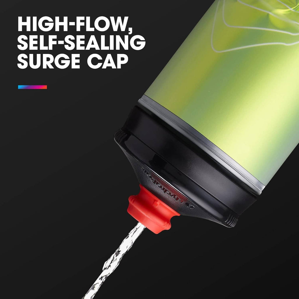 High-flow surge cap in red on a black bottle top with translucent body