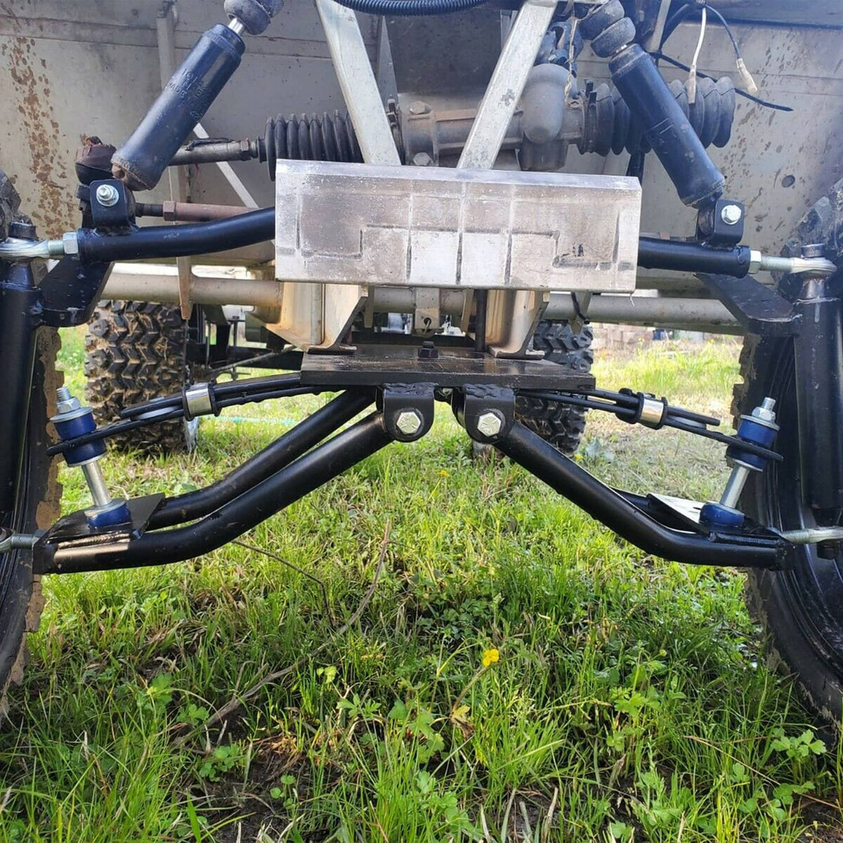 Installed golf cart A-arm lift kit and rear leaf spring mount under the chassis