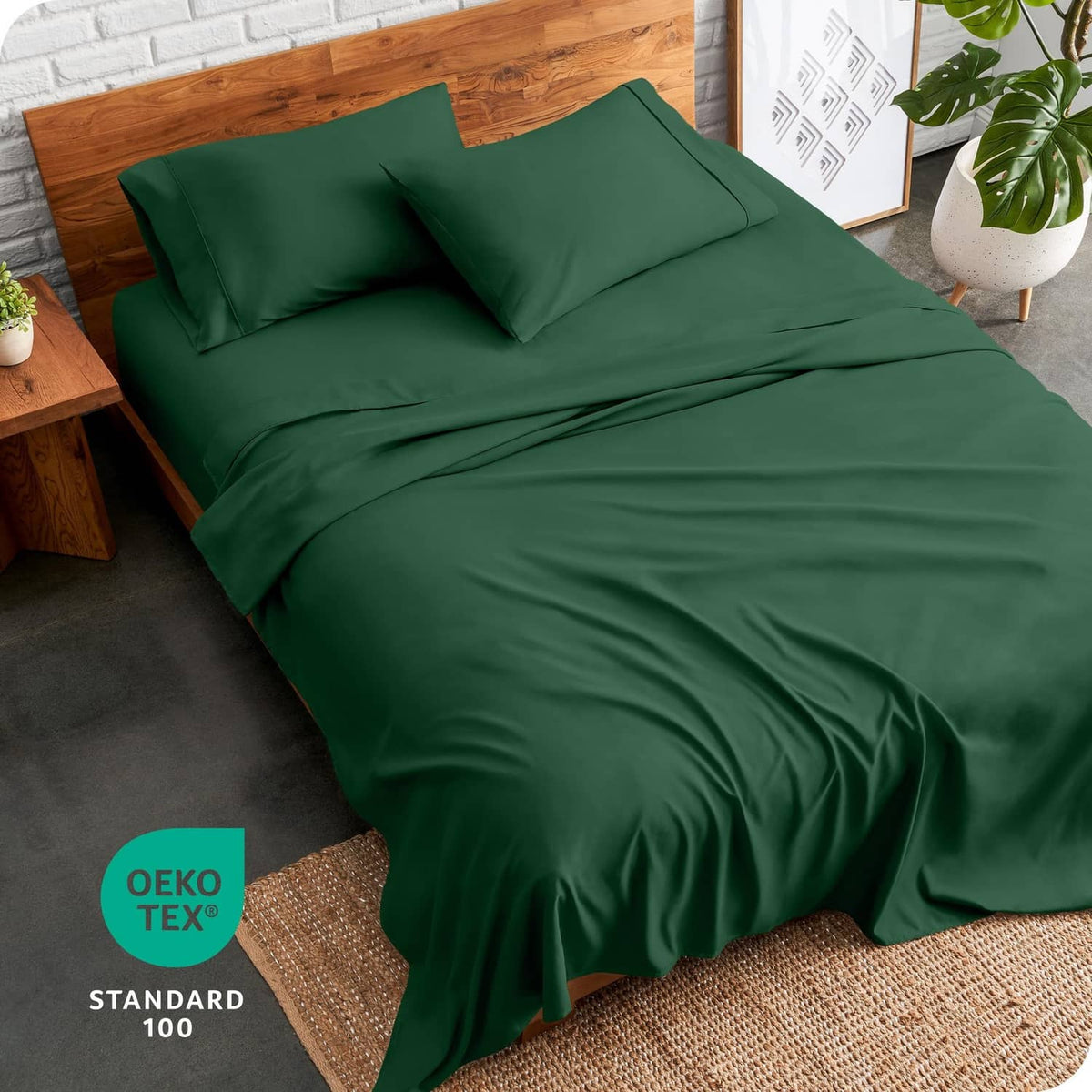 Forest green twin bed sheet set with fitted sheet and two pillows