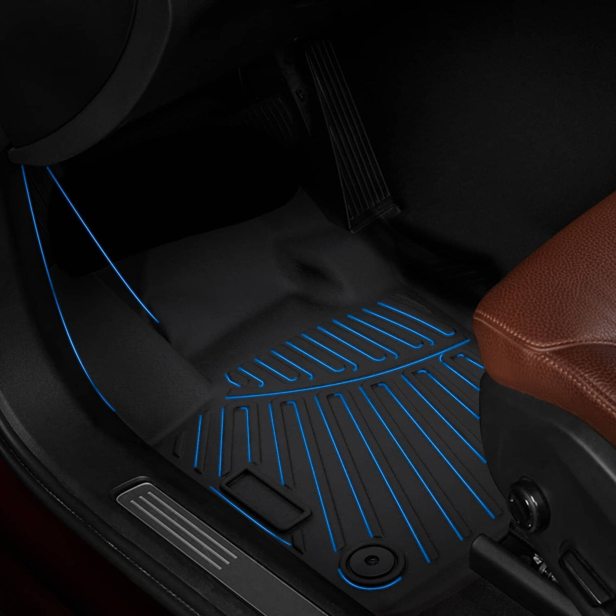 Black floor mat with blue-highlighted ridges and retention points on textured surface