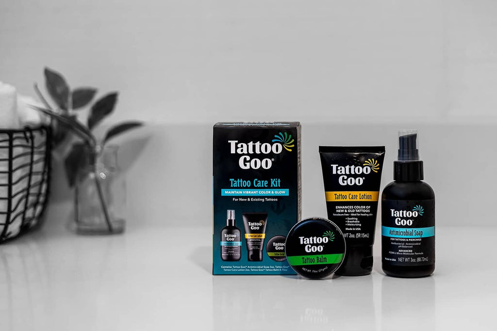 Tattoo Goo tattoo care kit with bottle, small jar, and travel-size lotion