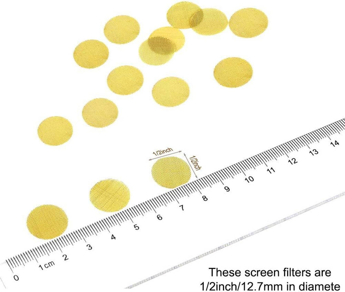 Brass pipe screen discs beside measuring ruler with diameter marks