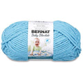 Light blue chenille-style yarn skein wrapped on paper label
