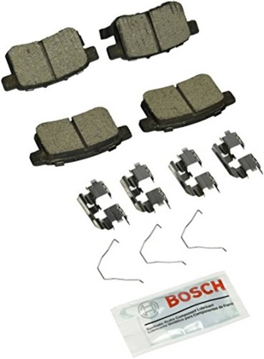 Disc brake pad set with 4 pads, metal hardware clips, and BOSCH package