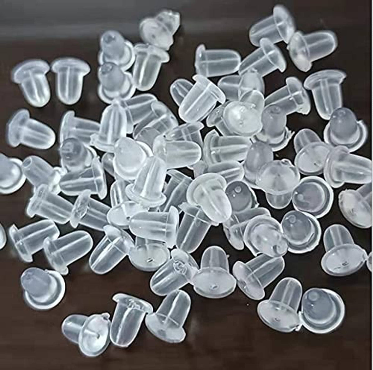 Clear plastic earring studs and backs, assorted pieces in a set