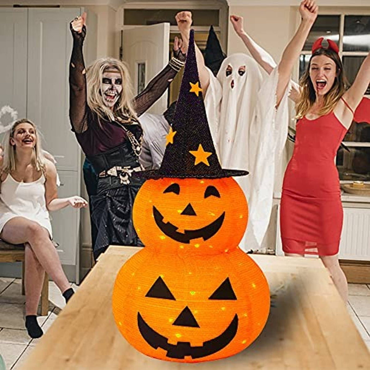 Pre-lit Halloween pumpkin decoration with black witch hat and orange glowing jack-o’-lantern