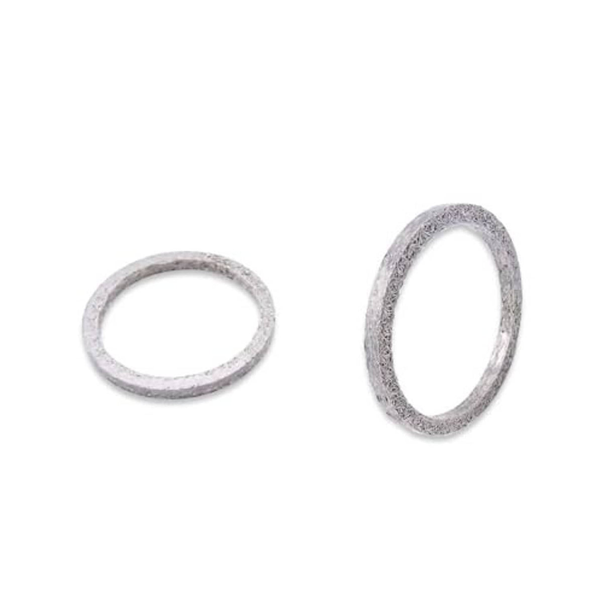 Exhaust port gasket kit with two gray steel mesh rings