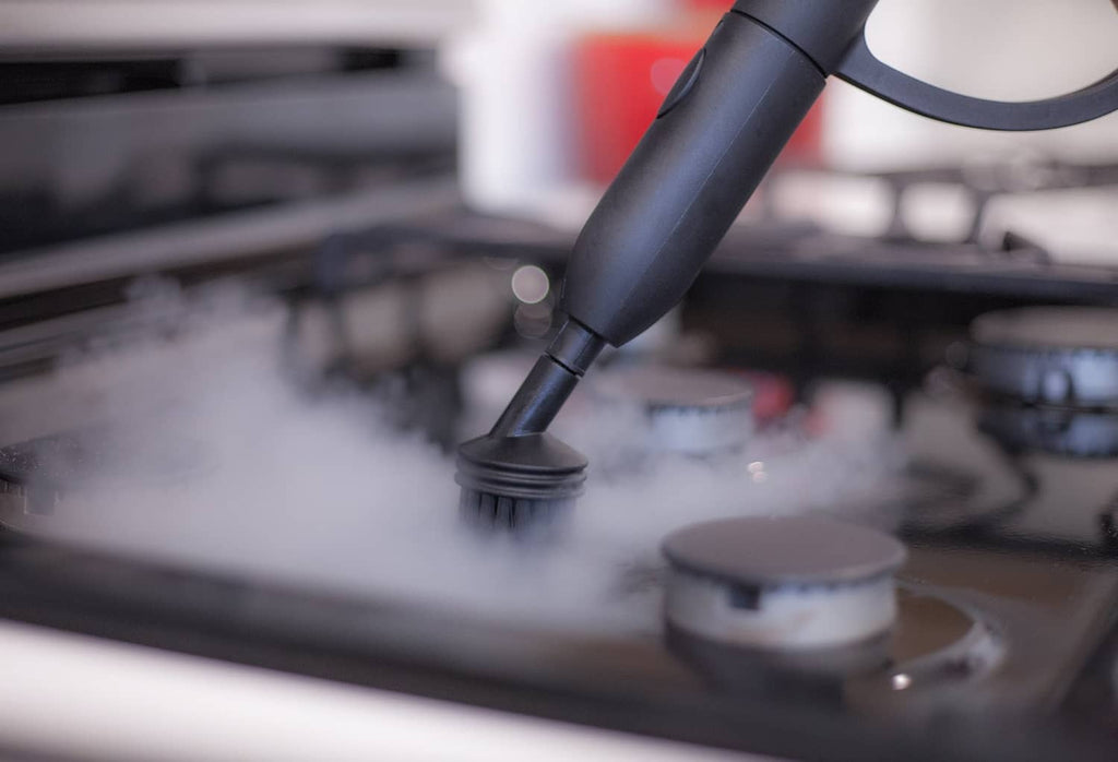 Steam nozzle tip with straight adaptor, releasing visible steam vapor