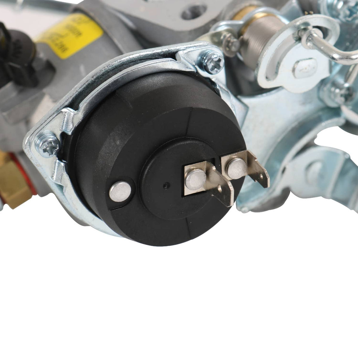 Carburetor vacuum diaphragm cover with wiring tab and metal bracket