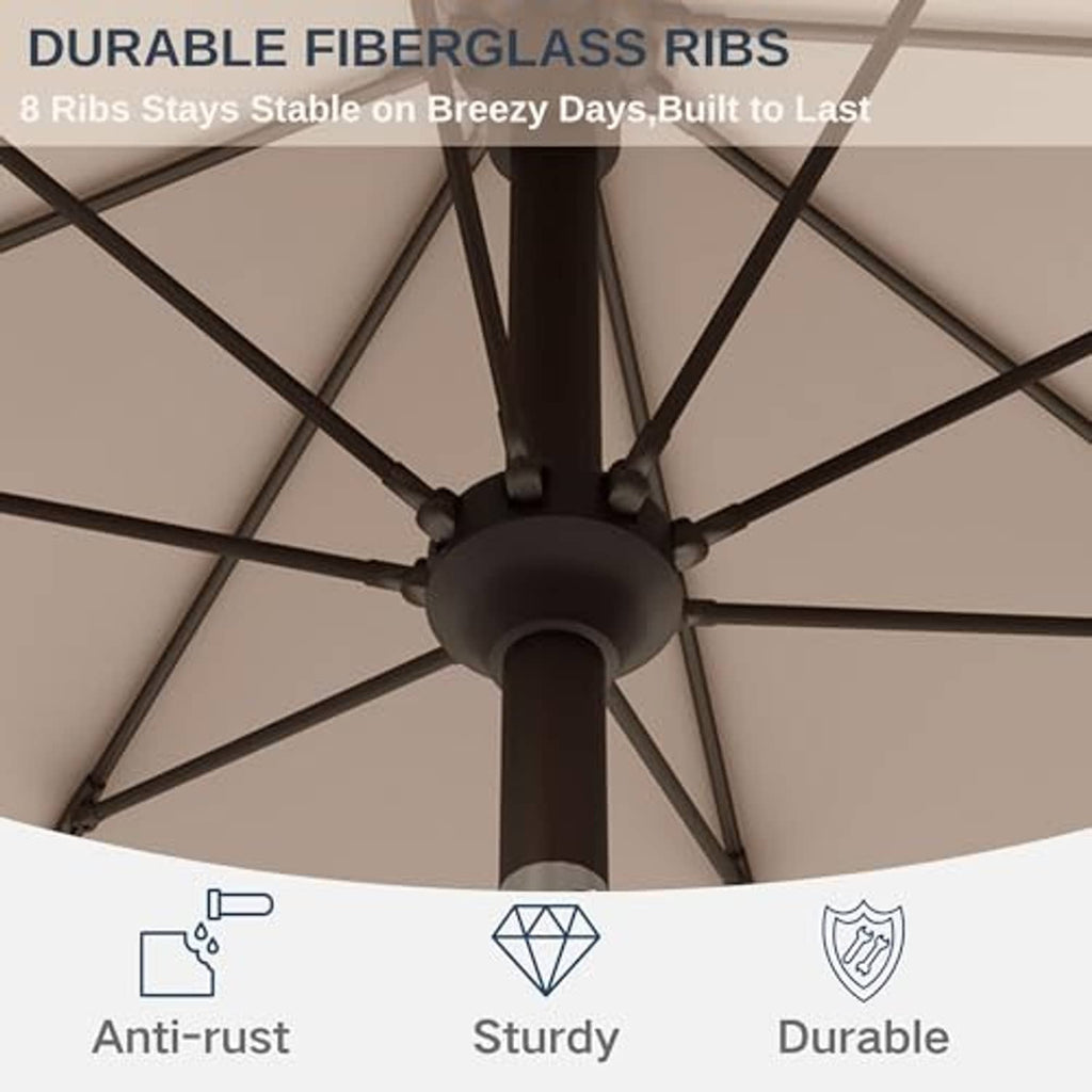 Beige patio umbrella top view showing thick fiberglass ribs and central hub