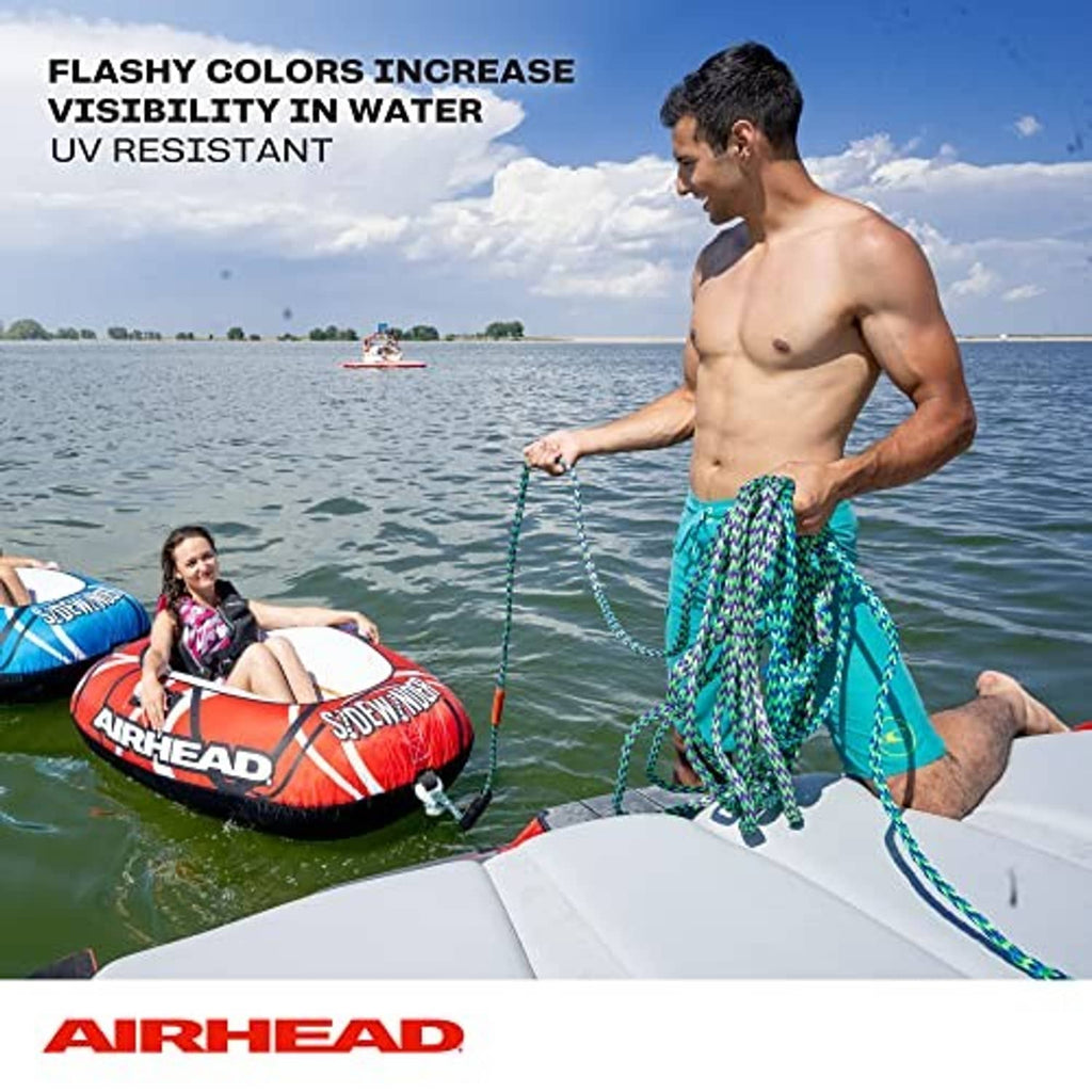 Braided tow rope in teal and blue, held for towing on a boat deck