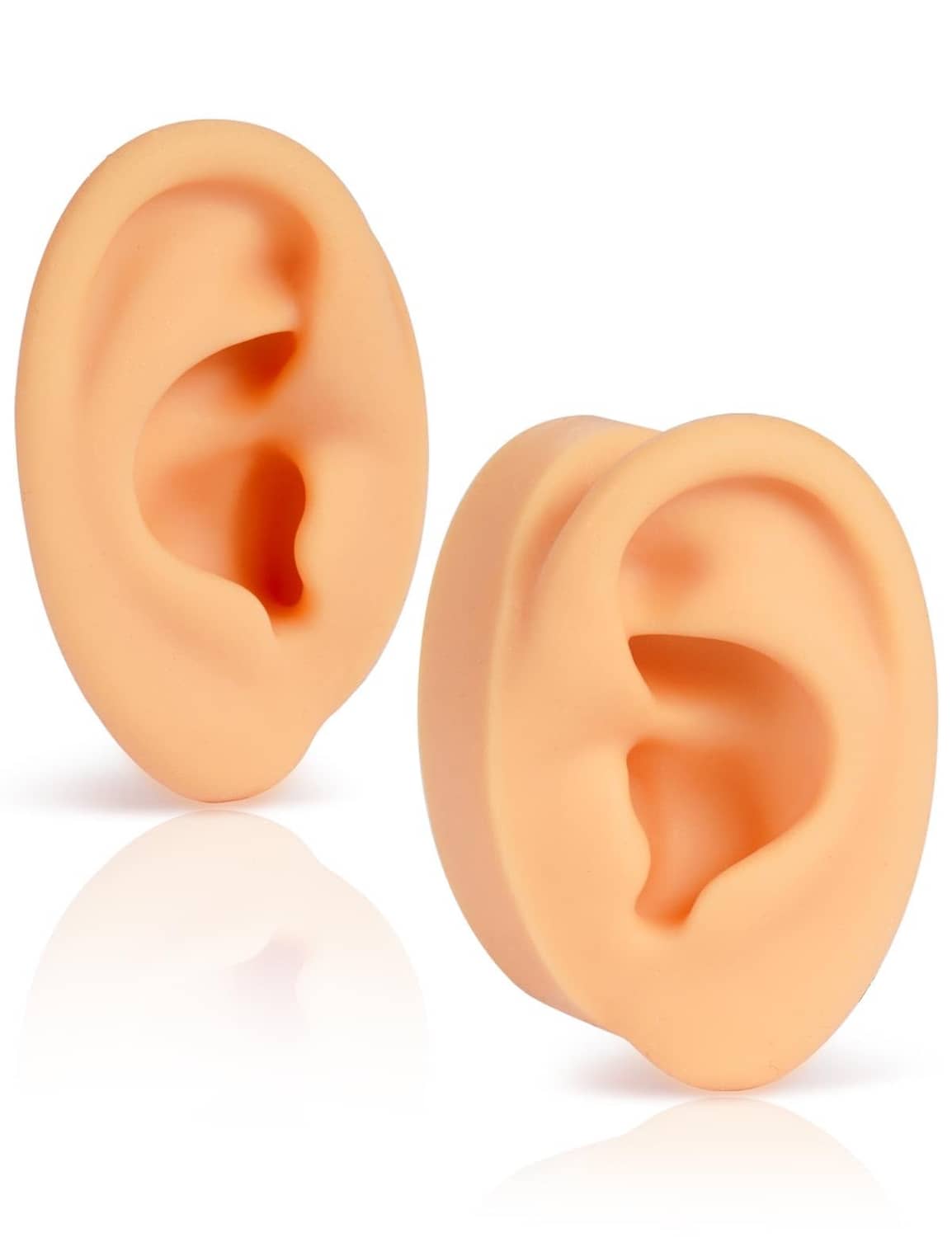 Pair of soft silicone ear models, left and right, skin-tone peach, realistic inner ear detail