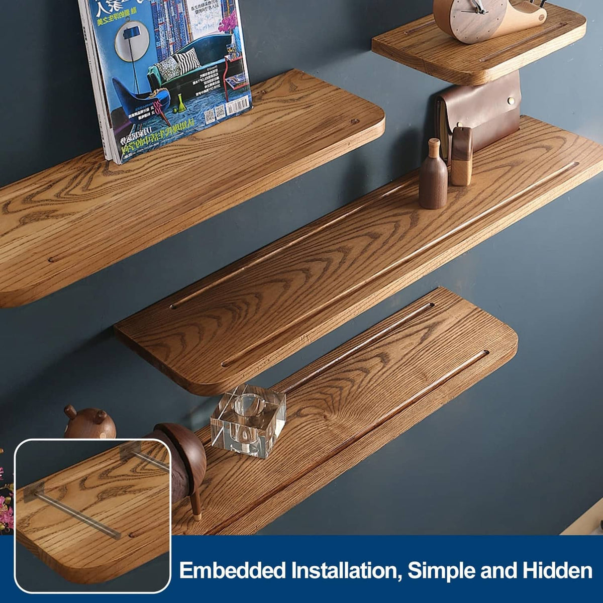 Set of black floating shelf brackets attached to wall-mounted wood shelves