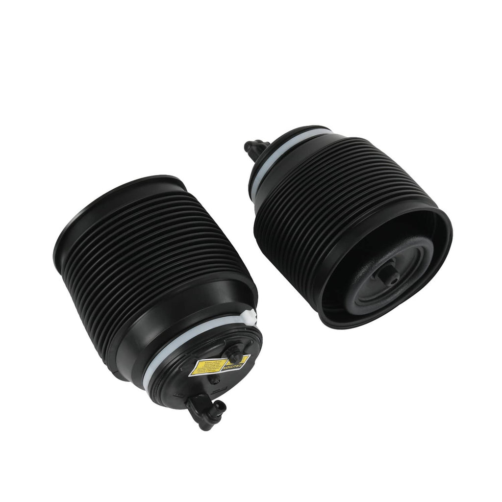 Black air suspension spring bags angled view, showing underside fittings and base ports.