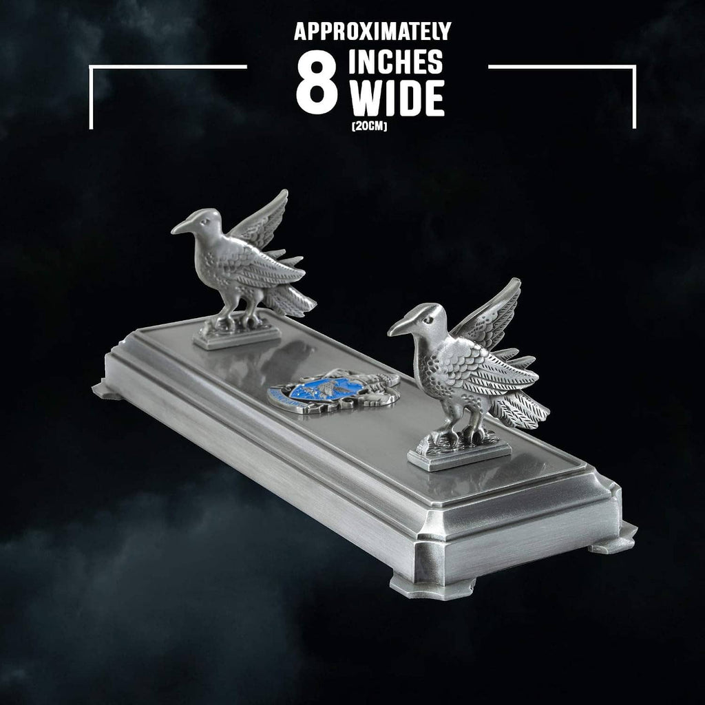 Silver wand stand with two raven figures and blue inlay, approximately 8 inches wide