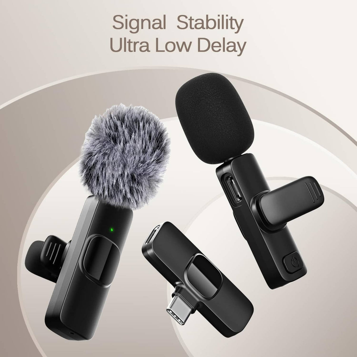Black wireless lavalier lapel microphones with furry windscreens and USB adapter