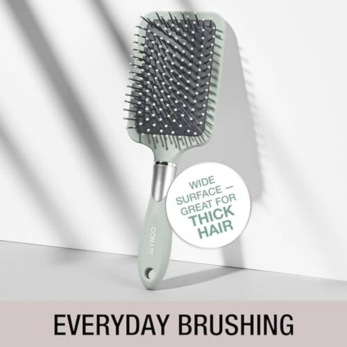 Mint paddle detangling hair brush with cushion base and ball-tipped nylon bristles