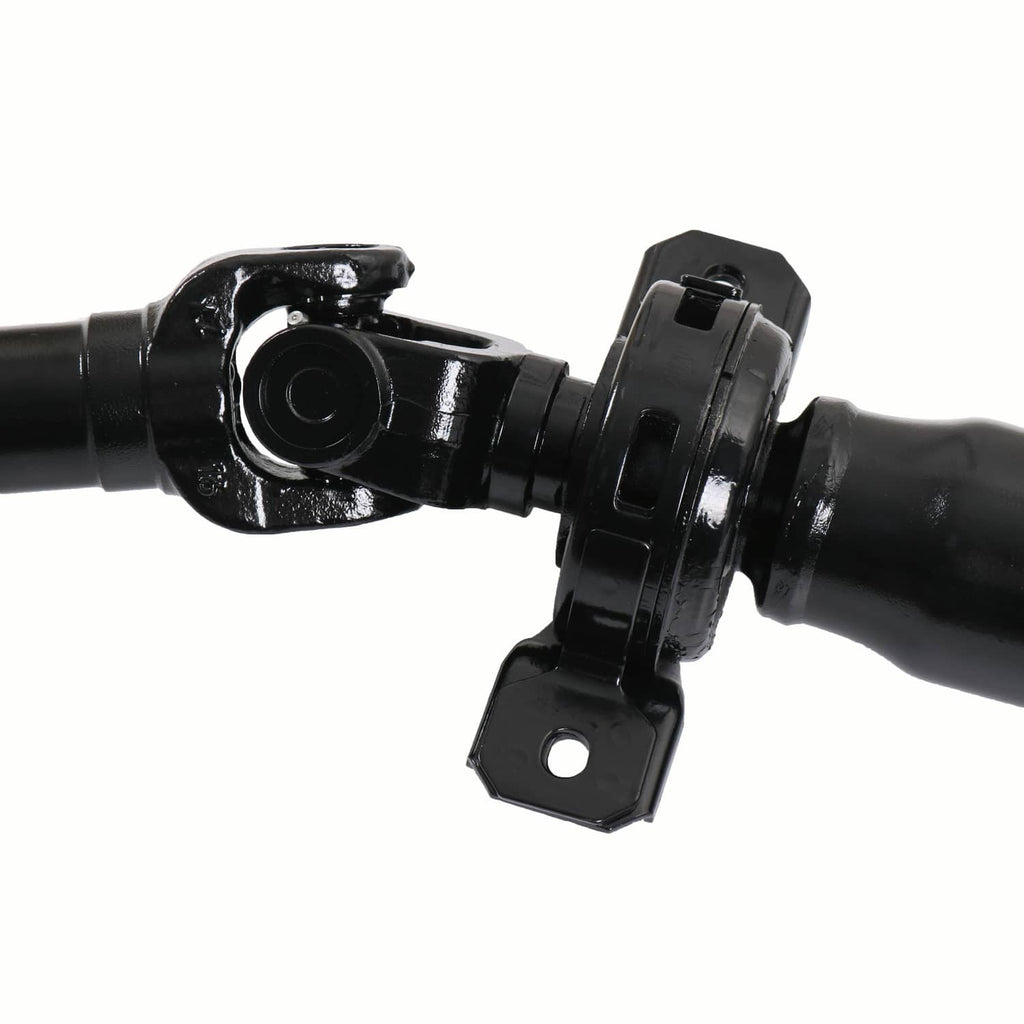 Rear driveshaft u-joint yoke with mounting bracket on black shaft