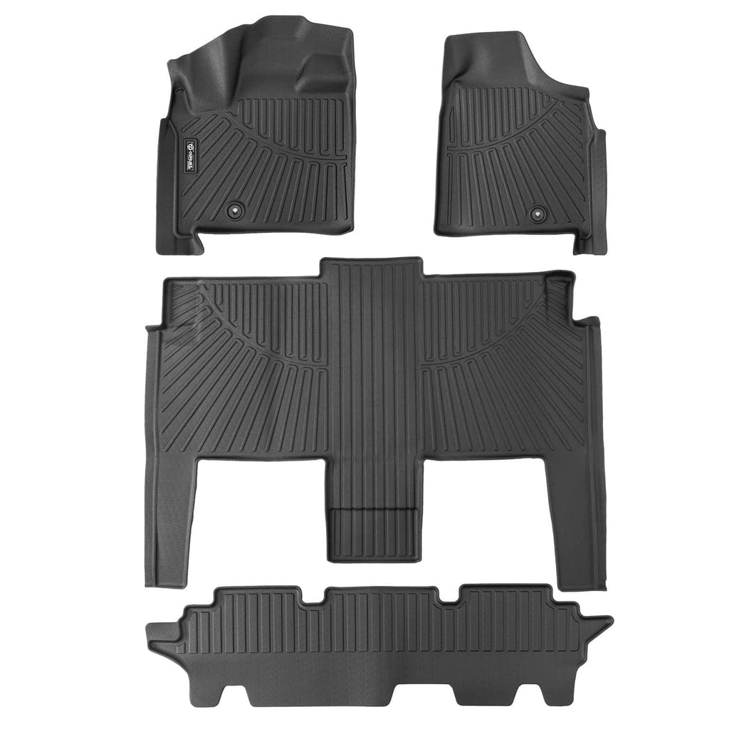 Dark gray rubber car floor mat set with molded channels, raised tread, and corner tabs