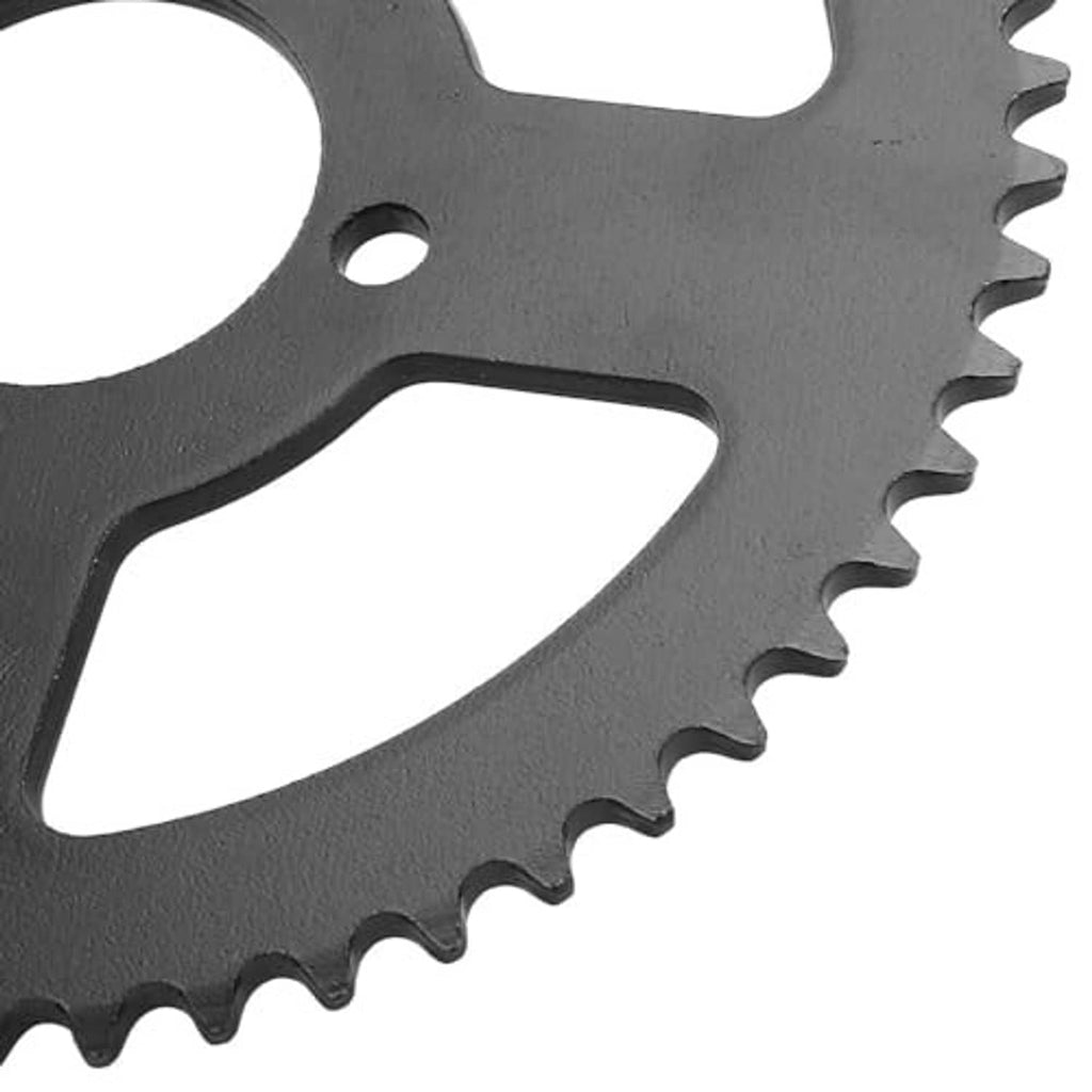 Close-up of dark sprocket teeth and mounting holes on a steel gear