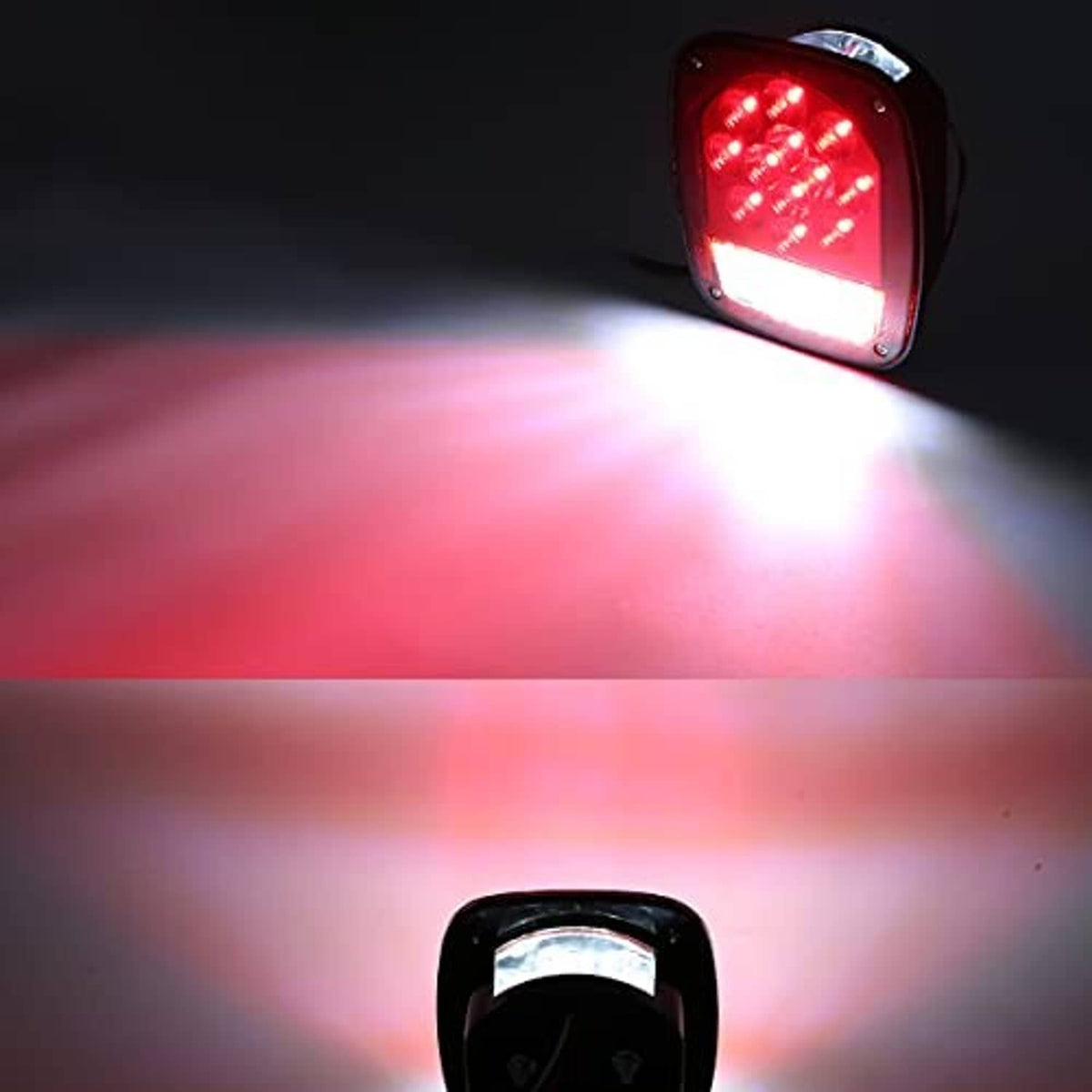Red LED trailer tail light with white strip, black housing (lit)
