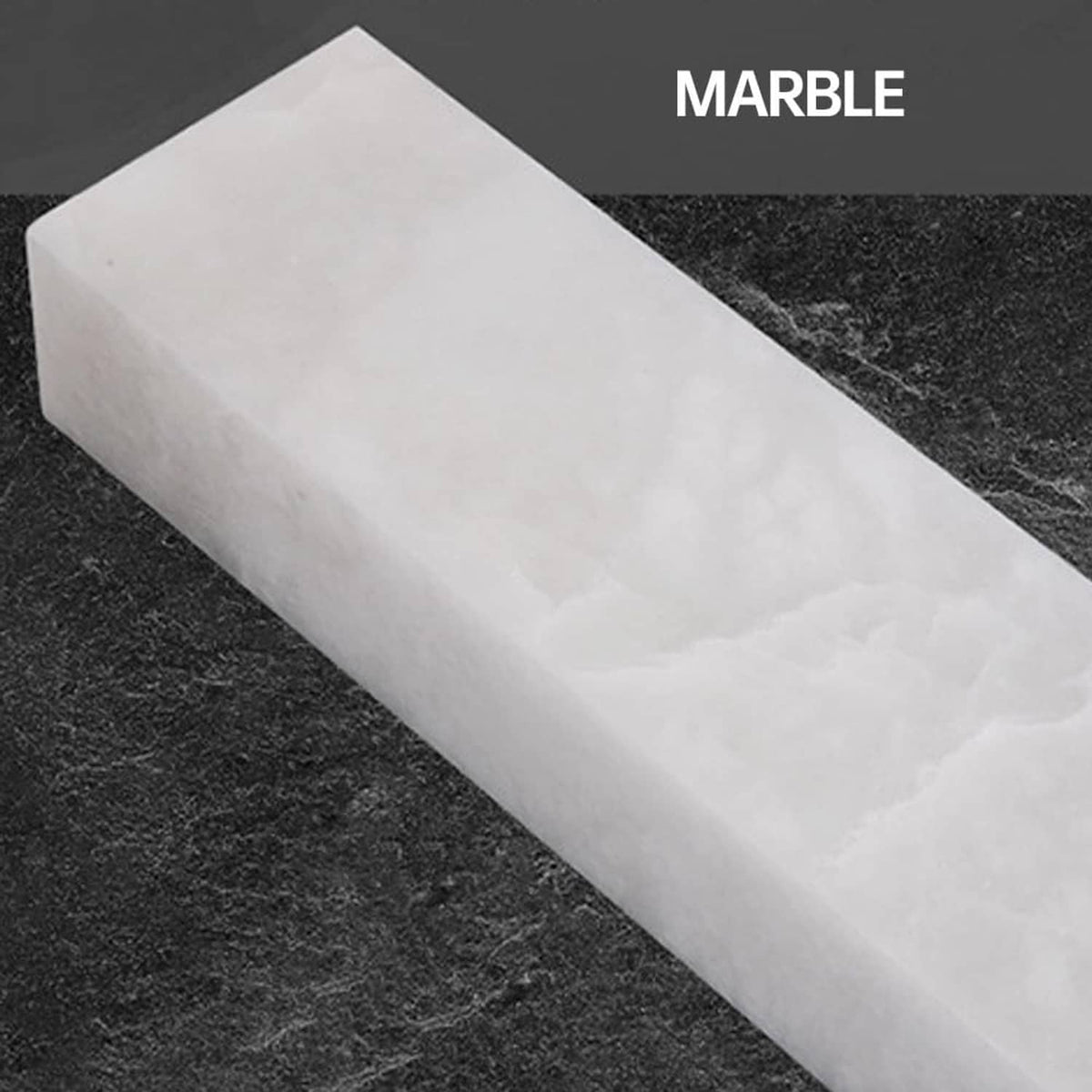White marble light panel with light gray veining in a rectangular block