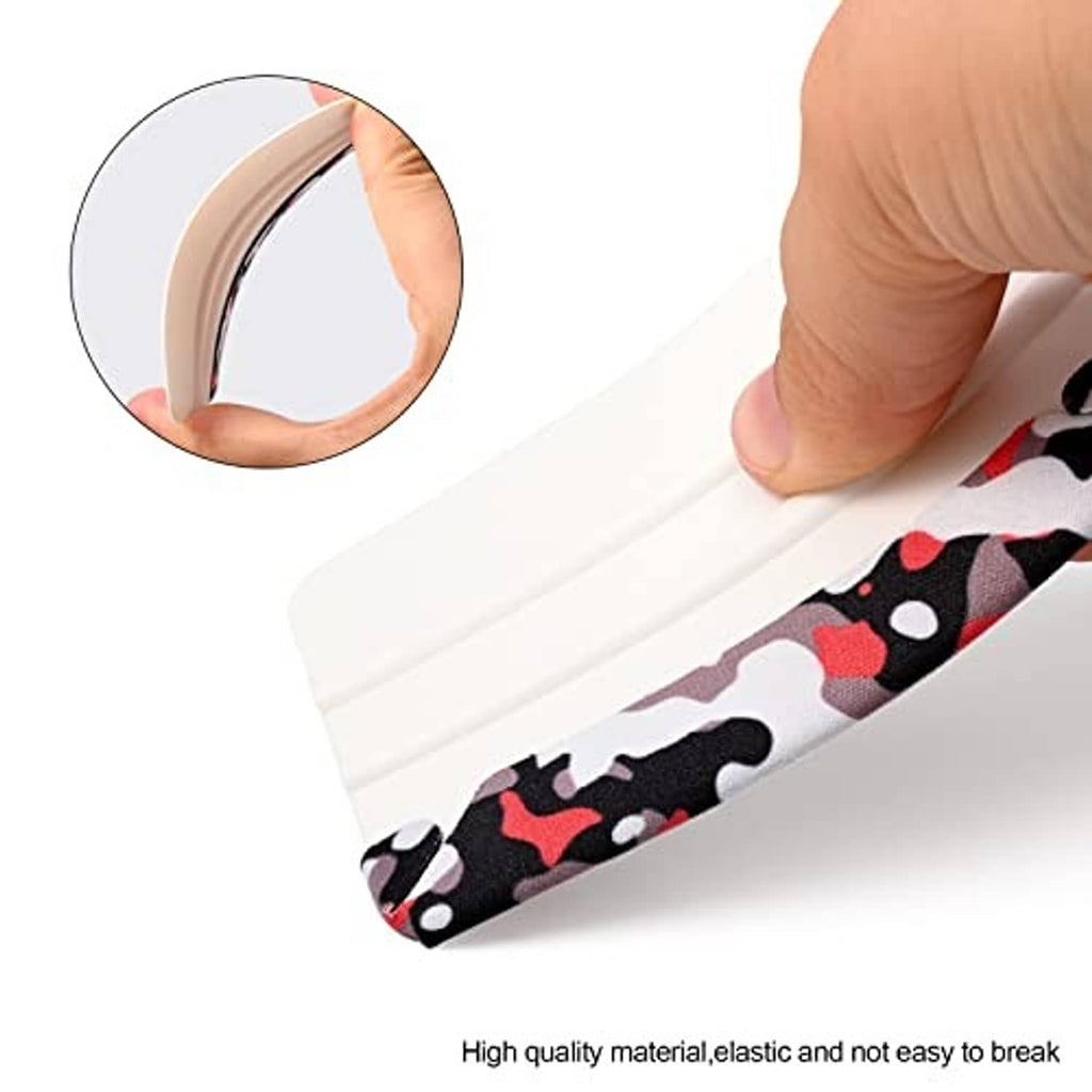 White plastic squeegee with camouflage felt edge bending around a curved surface