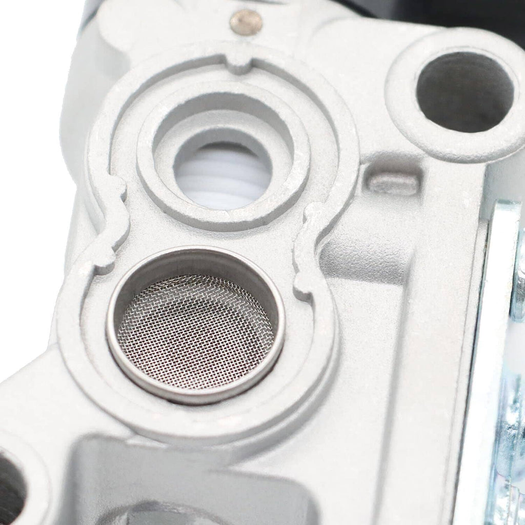 Idle air control valve close-up of metal body and mesh air filter screen