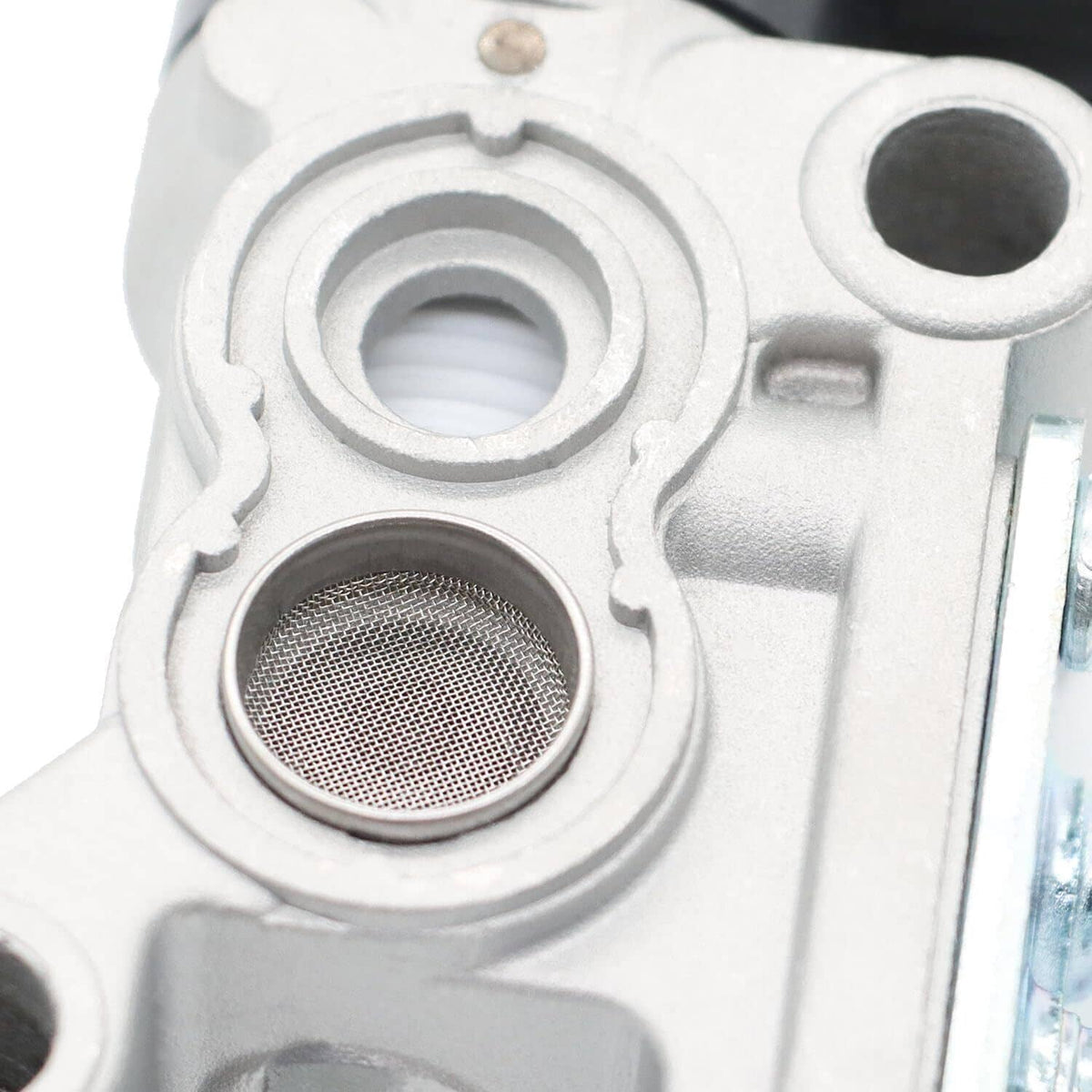 Idle air control valve close-up of metal body and mesh air filter screen
